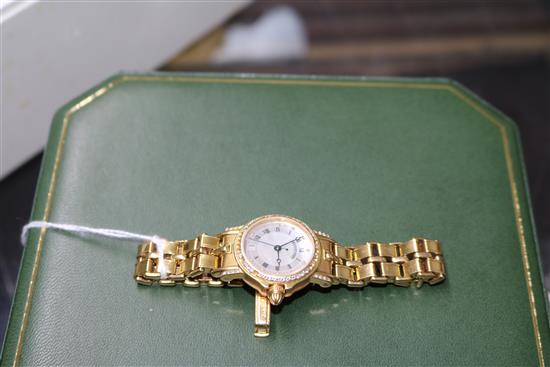 A ladys 18ct gold and diamond set Breguet wrist watch,